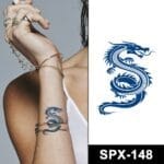 Woman wearing dragon arm tattoo