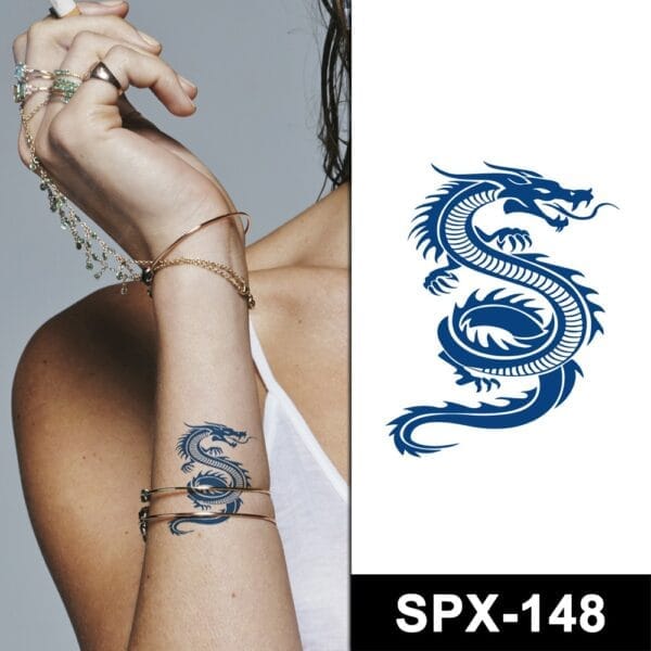 Woman wearing dragon arm tattoo Woman wearing dragon arm tattoo