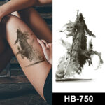 Dark warrior temporary tattoo on thigh