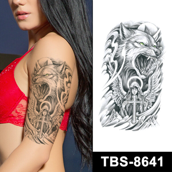 Wolf and angel tattoo on woman's arm